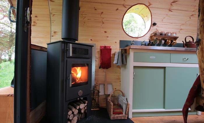 Log burner and kitchen